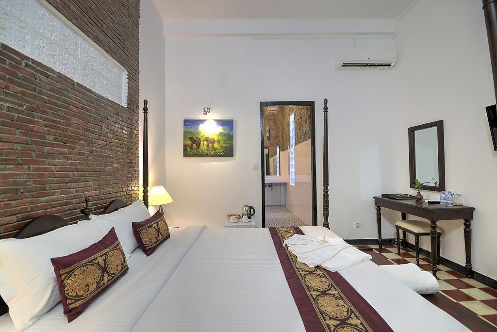 Prasats Boutique Hotel Phnompen Szoba fotó